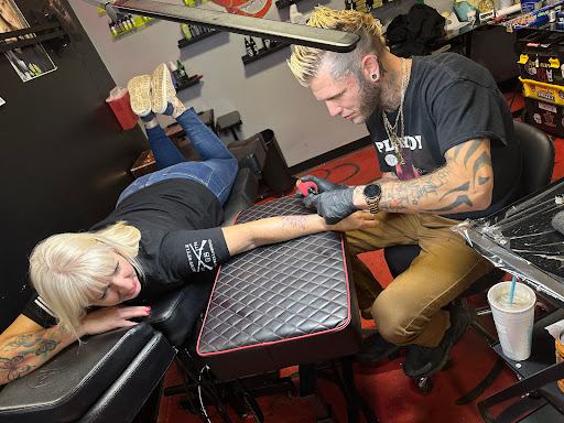 Find gym tattoo ideas for men for your next unique tattoo in Stuart at Kenny Tats Inkcorporated