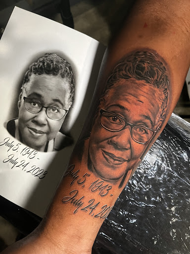 Explore man face tattoo ideas, creative tattoo ideas in Atlanta, available at Iron Palm Tattoos & Body Piercing Atlanta