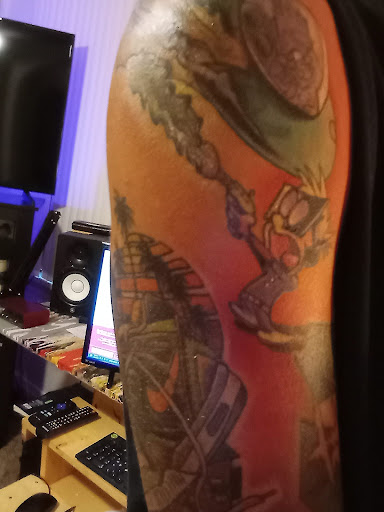 Explore death tattoos ideas, creative tattoo ideas in Erie, available at Code of Honor Tattoo