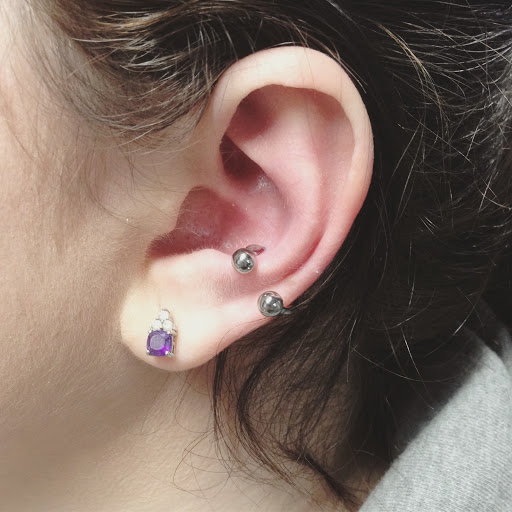 Explore tattoo ideas for men's shoulders, creative tattoo ideas in Oswego, available at Bodified