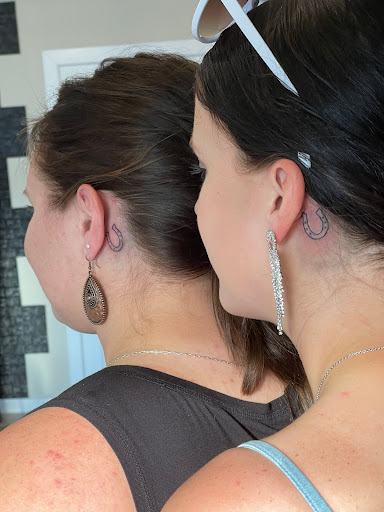 Explore tattoo ideas for women ankle, creative tattoo ideas in Huxley, available at Lonely Bones Tattoo & Art