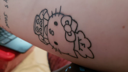 Explore tattoo ideas for a lost brother, creative tattoo ideas in Springfield, available at Area 51 Tattoo