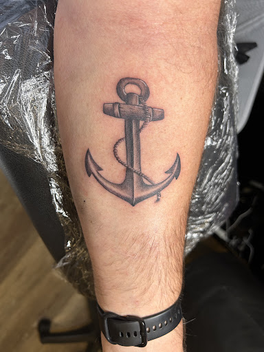 Explore basketball tattoo ideas small, creative tattoo ideas in Davenport, available at Fine Ink Studios Tattoos