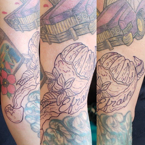 Find skull tattoo idea for your next unique tattoo in Traverse City at Pinups & Needles