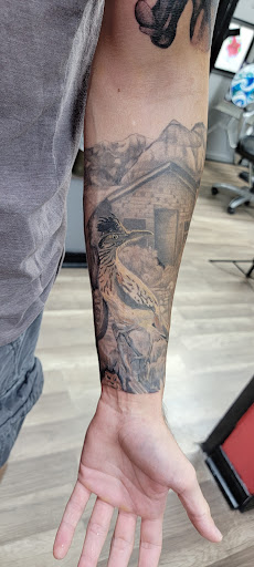 Explore tattoo ideas for men on forearm, creative tattoo ideas in Largo, available at Alchemy Tattoos and Body Piercings