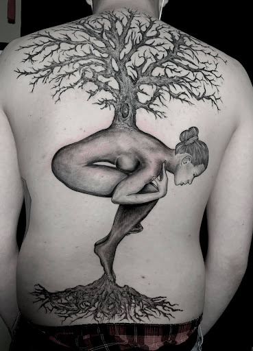 Explore dolphin tattoo ideas, creative tattoo ideas in Minneapolis, available at Tattoo Asylum