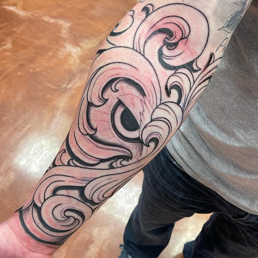Find animal neck tattoo ideas for your next unique tattoo in Aledo at Elevated Tattoo & Piercing