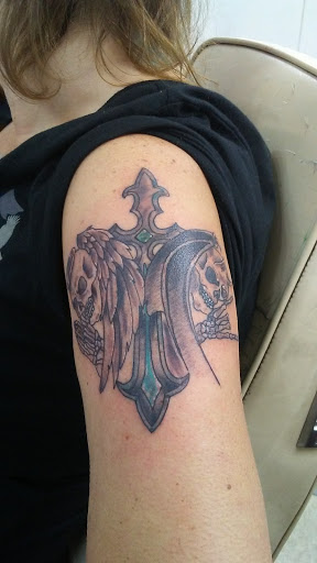 Explore different tattoo ideas for guys, creative tattoo ideas in Cadillac, available at Perfect Tattoos & Body Piercings