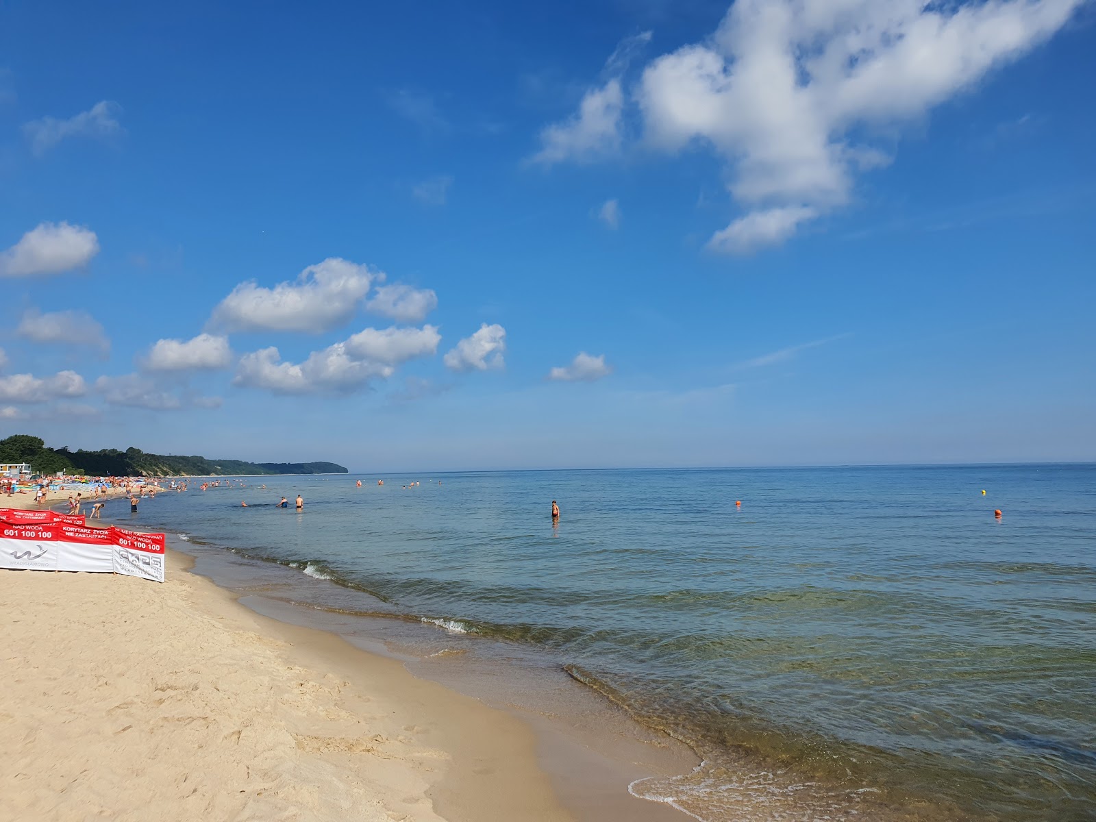 Foto di Wladyslawowo Beach con una superficie del sabbia beige fine
