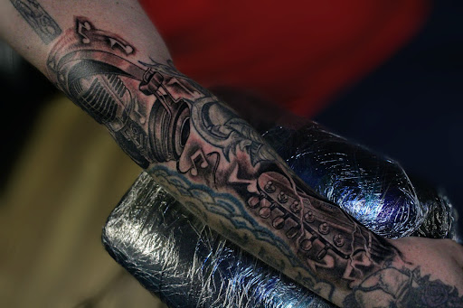 Explore anime forearm tattoo ideas, creative tattoo ideas in Homosassa, available at Citrus Tattoos