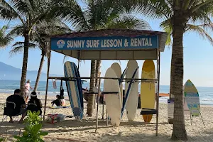 SUNNY SURF LESSON & RENTAL image