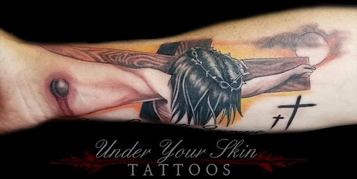 Explore bear claw tattoo ideas, creative tattoo ideas in Green Cove Springs, available at Under Your Skin Tattoos