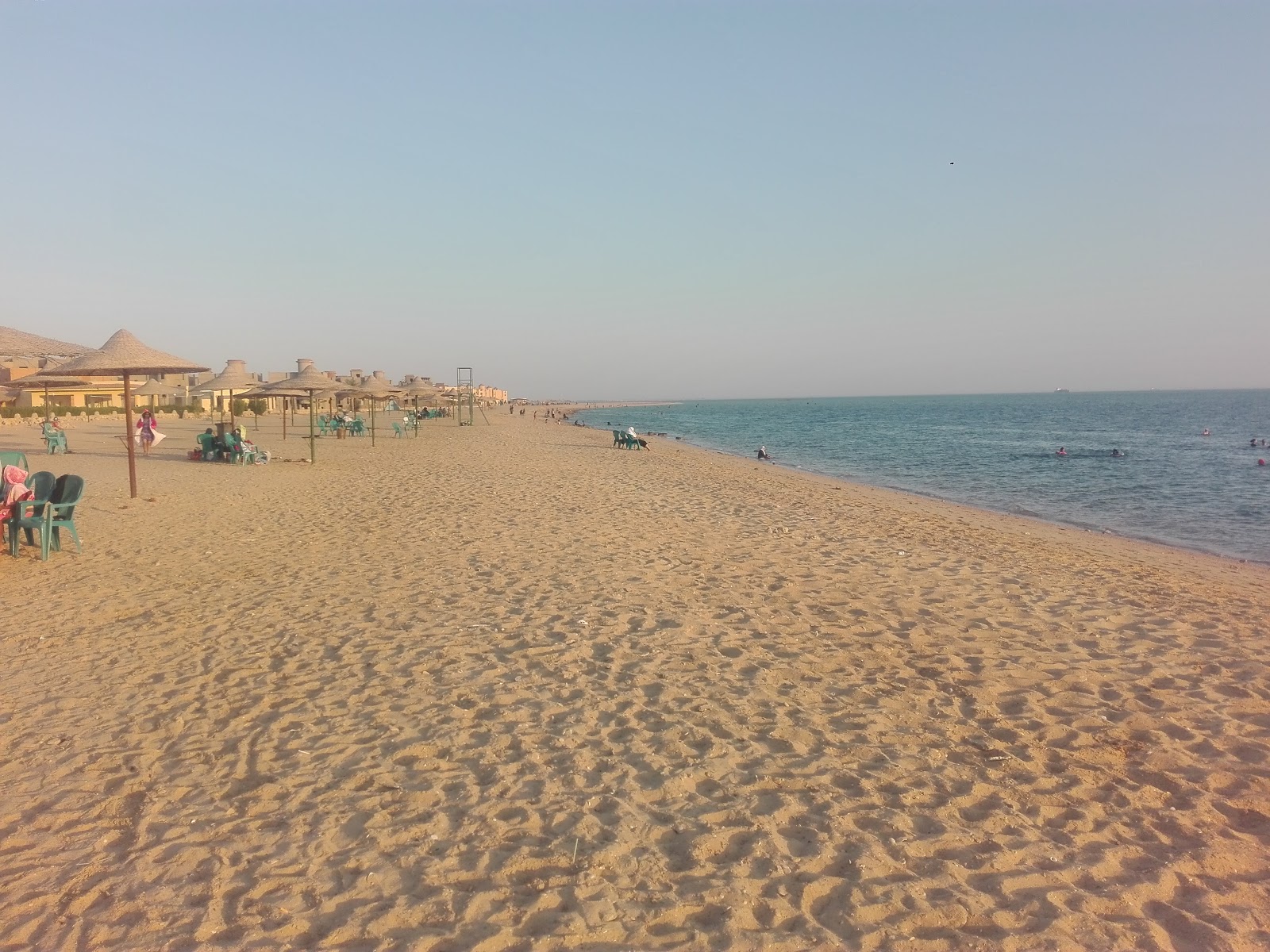 Fotografija Abu Nunes Beach z svetel pesek površino