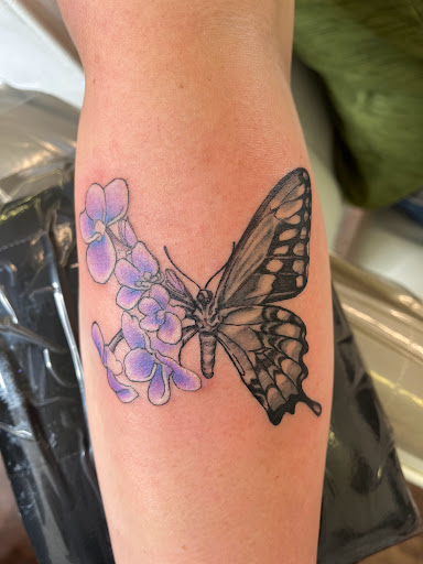 Explore fine line hand tattoo ideas, creative tattoo ideas in Rogers, available at Ink Solutions Tattoo