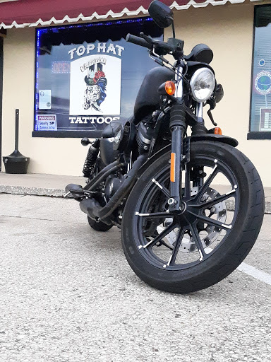 Explore husband name tattoo ideas for wife, creative tattoo ideas in Tulsa, available at Renegades Top Hat Tattoos