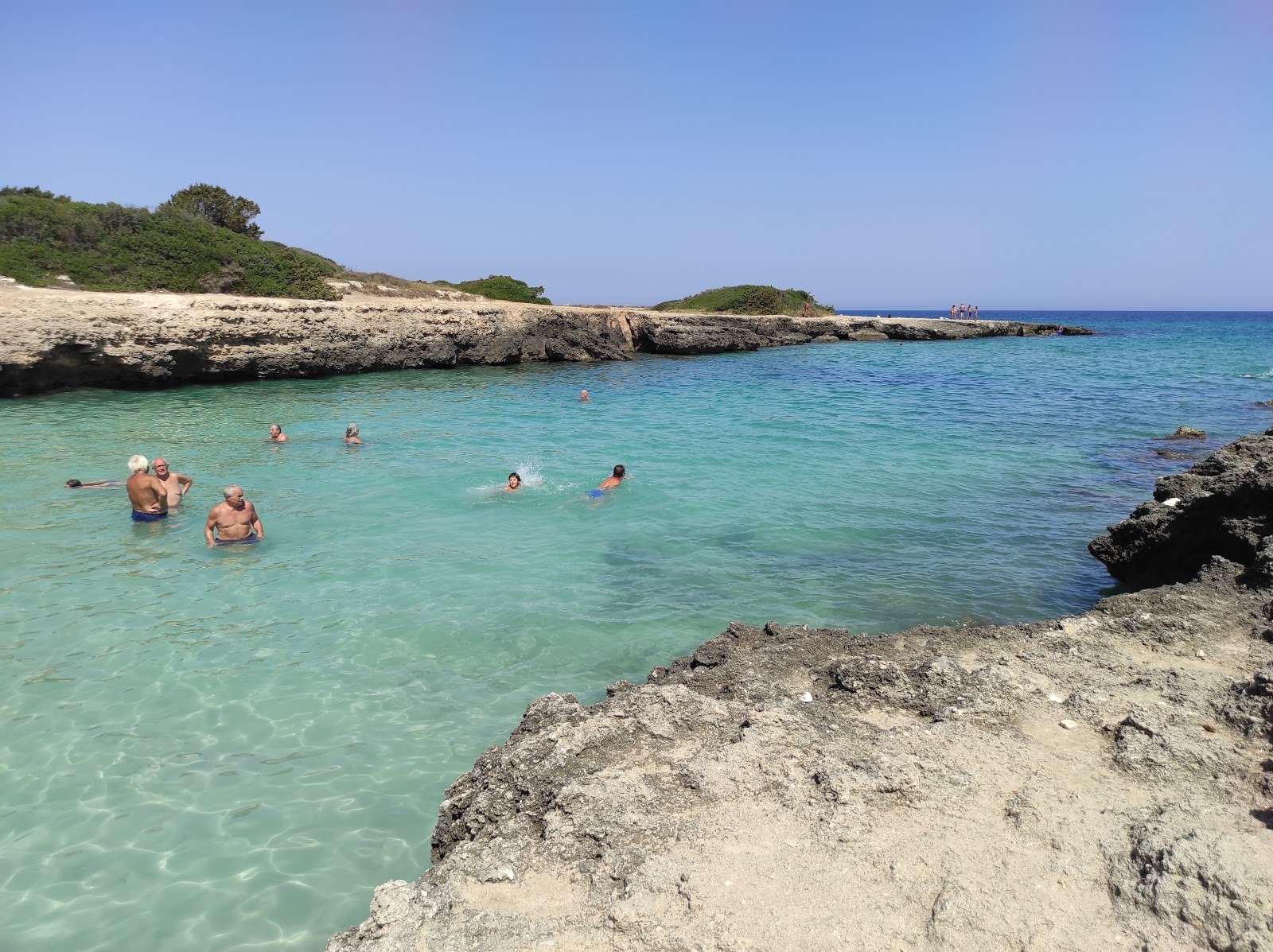 Foto af Torre Pozzelle beaches med små multibays