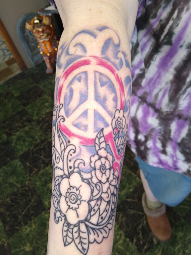 Explore tattoo ideas for women's arms, creative tattoo ideas in Caldwell, available at Craigs Tattoo Co