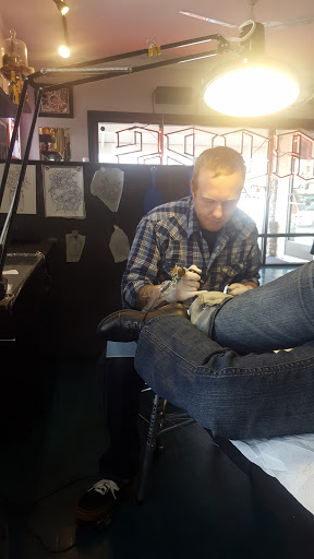 Explore peace tattoo ideas, creative tattoo ideas in Reno, available at Aces Tattoo