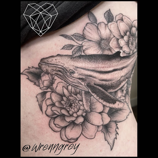 Explore filmmaker tattoo ideas, creative tattoo ideas in Spokane, available at Moms Custom Tattoo & Body Piercing