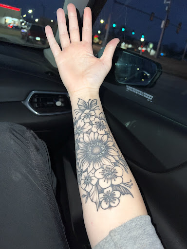 Explore snail tattoo ideas, creative tattoo ideas in Osage Beach, available at Lake Ozark Tattoo and Hair Studio