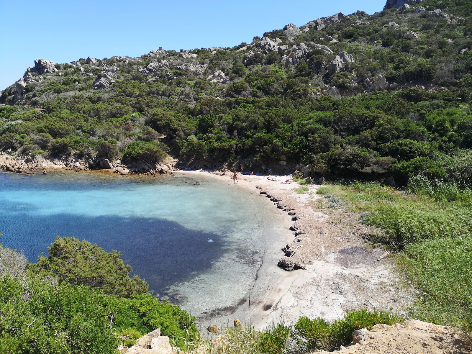 Photo of Cala Lunga beach with partly clean level of cleanliness