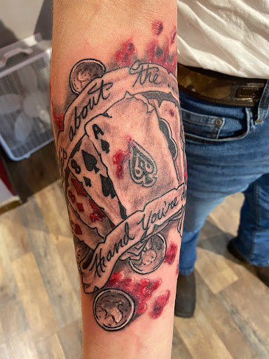 Explore kpop tattoo ideas, creative tattoo ideas in Pikeville, available at The Carbon Canary Tattoo Studio