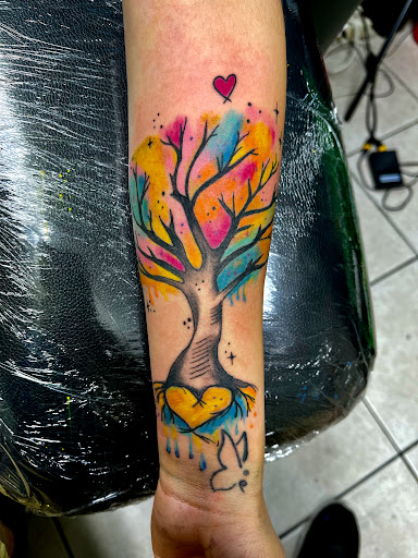 Explore feather memorial tattoo ideas, creative tattoo ideas in Gadsden, available at Zekez Inkz Tattoos & Piercings