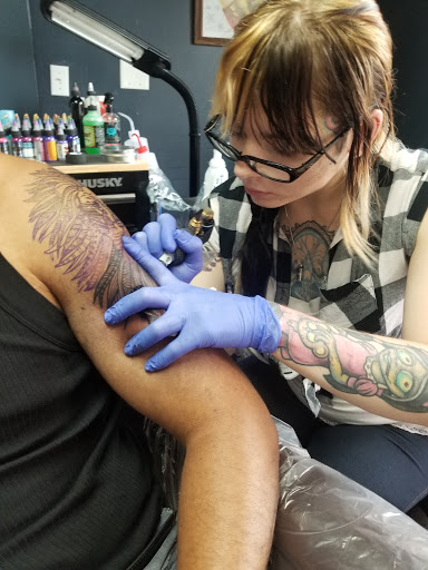 Explore songbird tattoo ideas, creative tattoo ideas in Chapel Hill, available at Golden Falcon Tattoo and Piercing