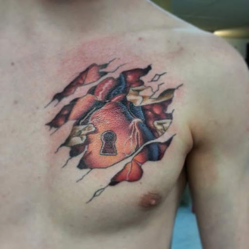 Find breast tattoo ideas for females for your next unique tattoo in Yorktown at Army Navy Tattoo