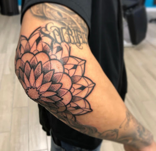 Explore bob marley tattoo ideas, creative tattoo ideas in Springdale, available at Tattoo Cartel