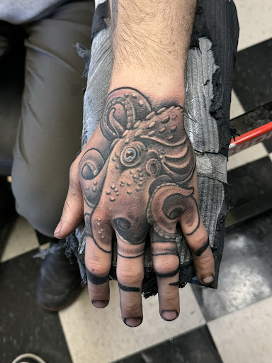 Explore lower stomach tattoo ideas, creative tattoo ideas in Newport, available at Newport Tattoo