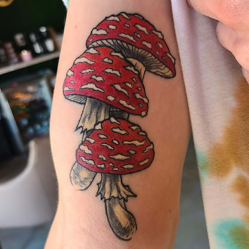 Explore trash polka tattoo ideas, creative tattoo ideas in Rogers, available at Tailored Fit Tattoo and Gallery