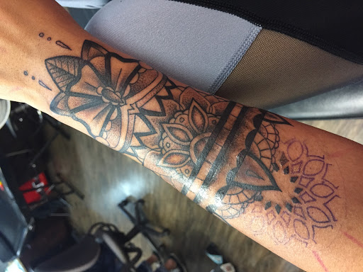 Explore covering up name tattoos ideas, creative tattoo ideas in Forney, available at Supernatural Tattoo Studio