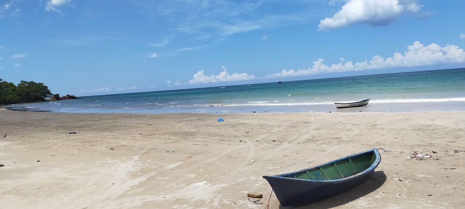 Foto von Indarason Beach mit langer gerader strand