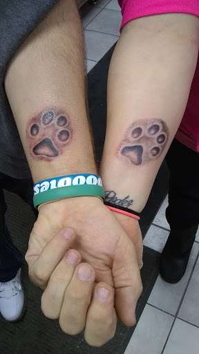 Explore fist tattoo ideas, creative tattoo ideas in Pittsfield, available at Intradermal Designs