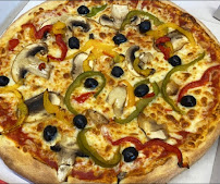 Plats et boissons du Pizzeria Place Pizza - Louvres - n°19