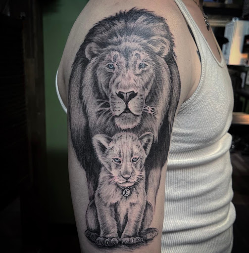Explore male ankle tattoo ideas, creative tattoo ideas in Grand Island, available at The Shaded Dahlia Piercing & Tattoo Parlor