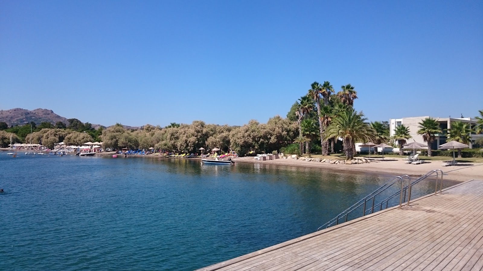 Foto de Dalga beach con arena marrón superficie