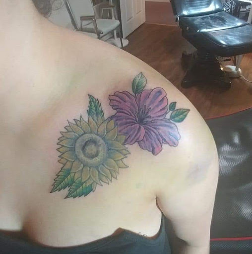 Explore barbie tattoo ideas, creative tattoo ideas in Russellville, available at Big Country Tattoos