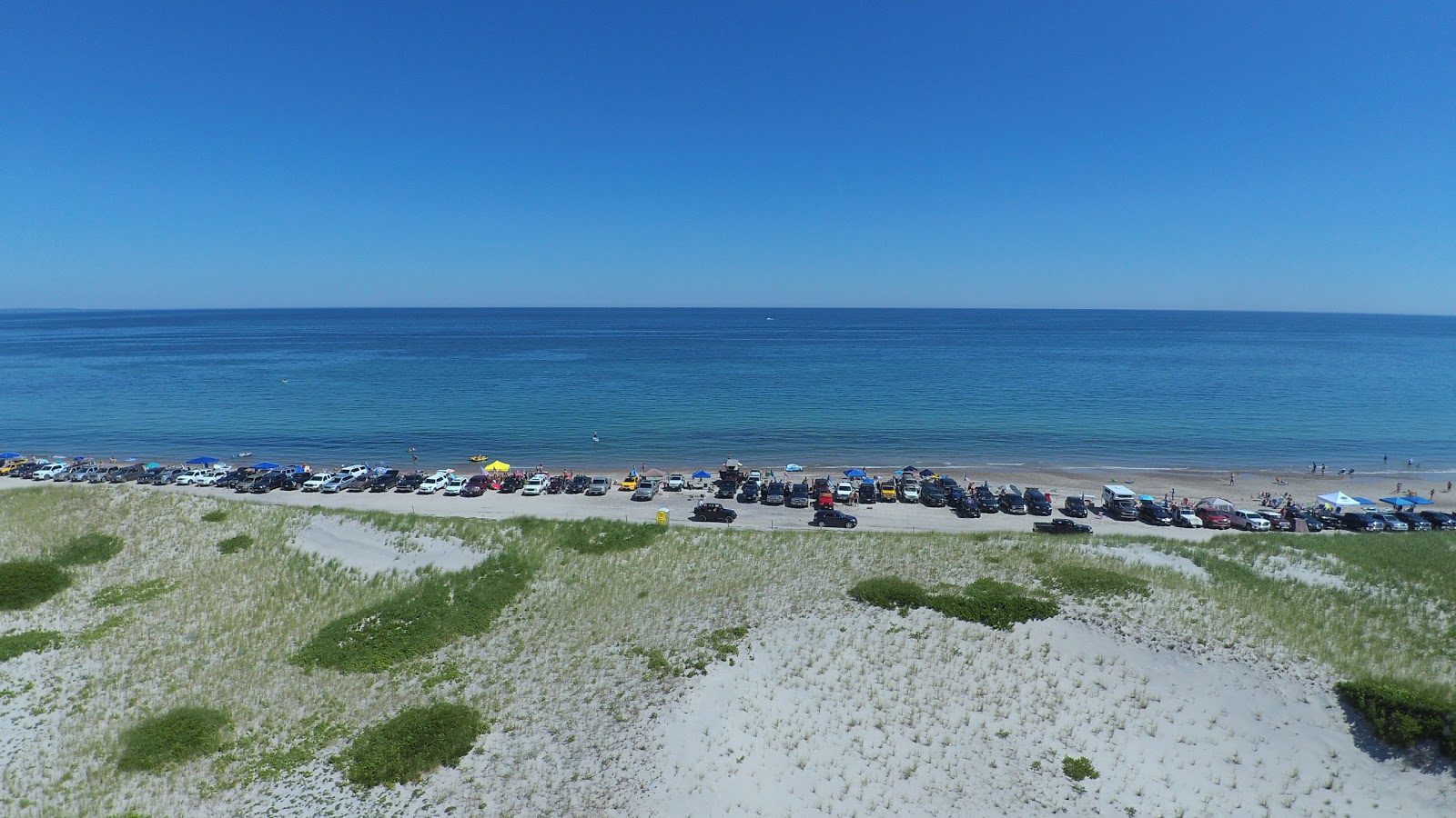 Foto von Sandwich beach und die siedlung