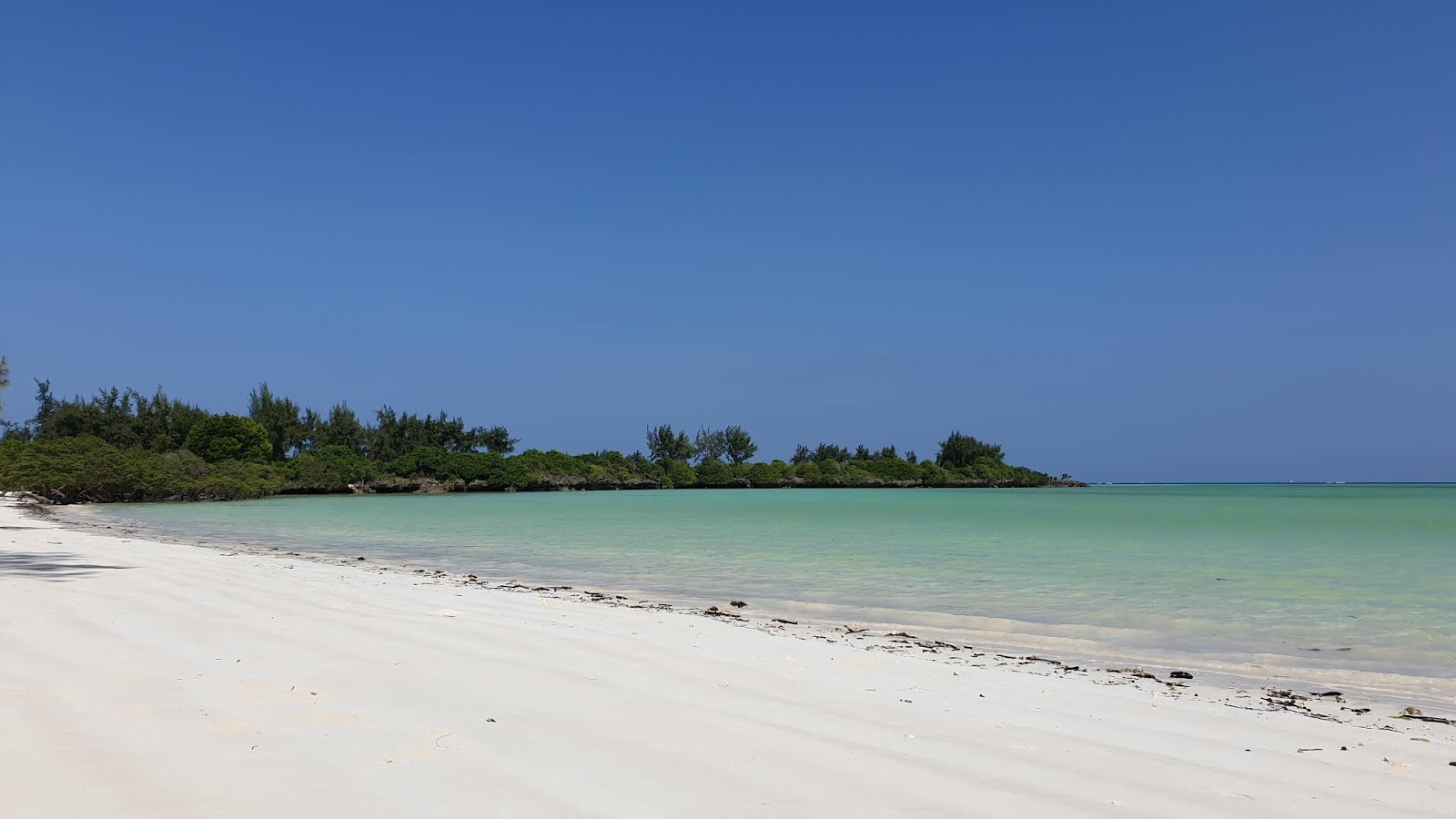 Φωτογραφία του Pemba Beach με λεπτή λευκή άμμος επιφάνεια