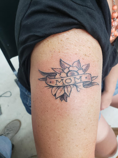 Explore ski mask tattoo ideas, creative tattoo ideas in Casper, available at Electric Hare Tattoo