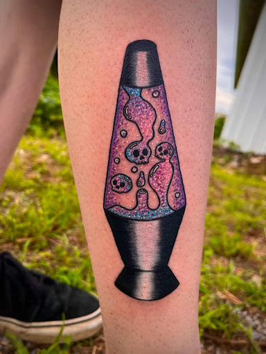 Explore half of sleeve tattoo ideas, creative tattoo ideas in Benton, available at Spectrum Tattoo