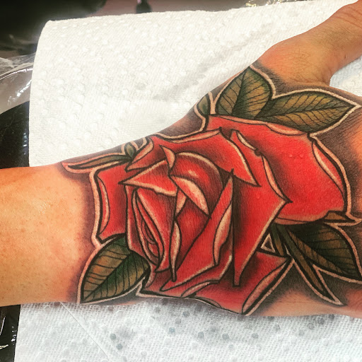 Explore hairdresser tattoo ideas, creative tattoo ideas in Sarasota, available at SEVEN SINS Tattoo Studio