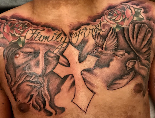 Explore half leg sleeve tattoo ideas for men, creative tattoo ideas in Evans Mills, available at Undeniable Ink