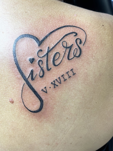 Explore men's inner bicep tattoo ideas, creative tattoo ideas in Orange, available at Smokin Irons Tattoo