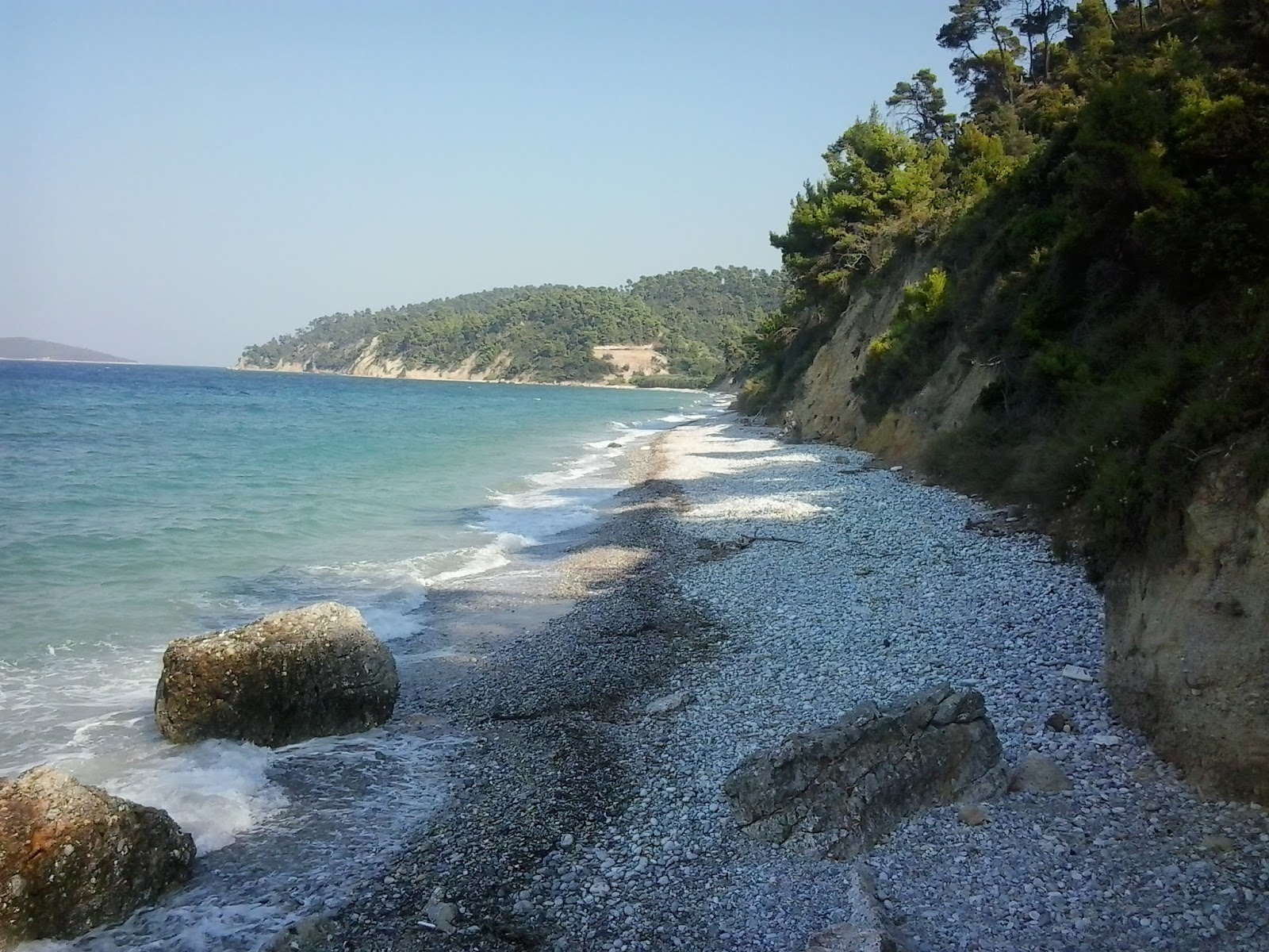 Photo of Koutsoupri 2 beach with gray fine pebble surface