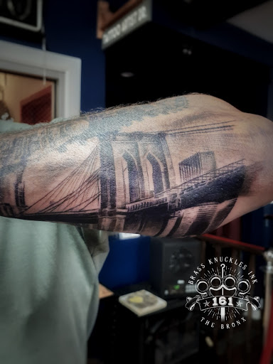 Explore elbow tattoo ideas male, creative tattoo ideas in Bronx, available at Brass Knuckles Ink Tattoo Studio