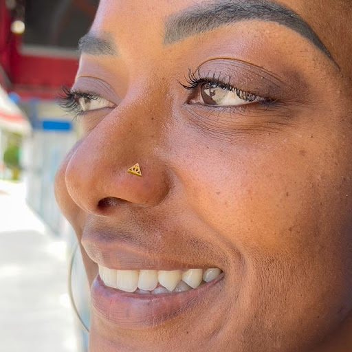 Explore butterfly tattoo ideas on arm, creative tattoo ideas in West Palm Beach, available at GURU Tattoo & Piercing - Palm Beach County