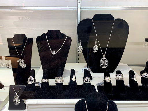 Explore pulp fiction tattoo ideas, creative tattoo ideas in Newton, available at Danas Fine Jewelry, Inc.